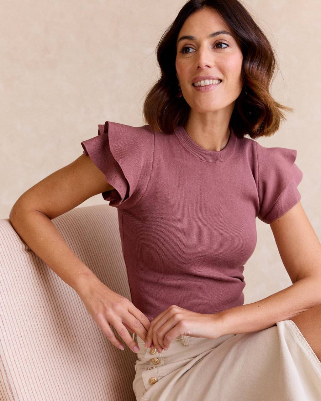 Top con volant in maglia malva